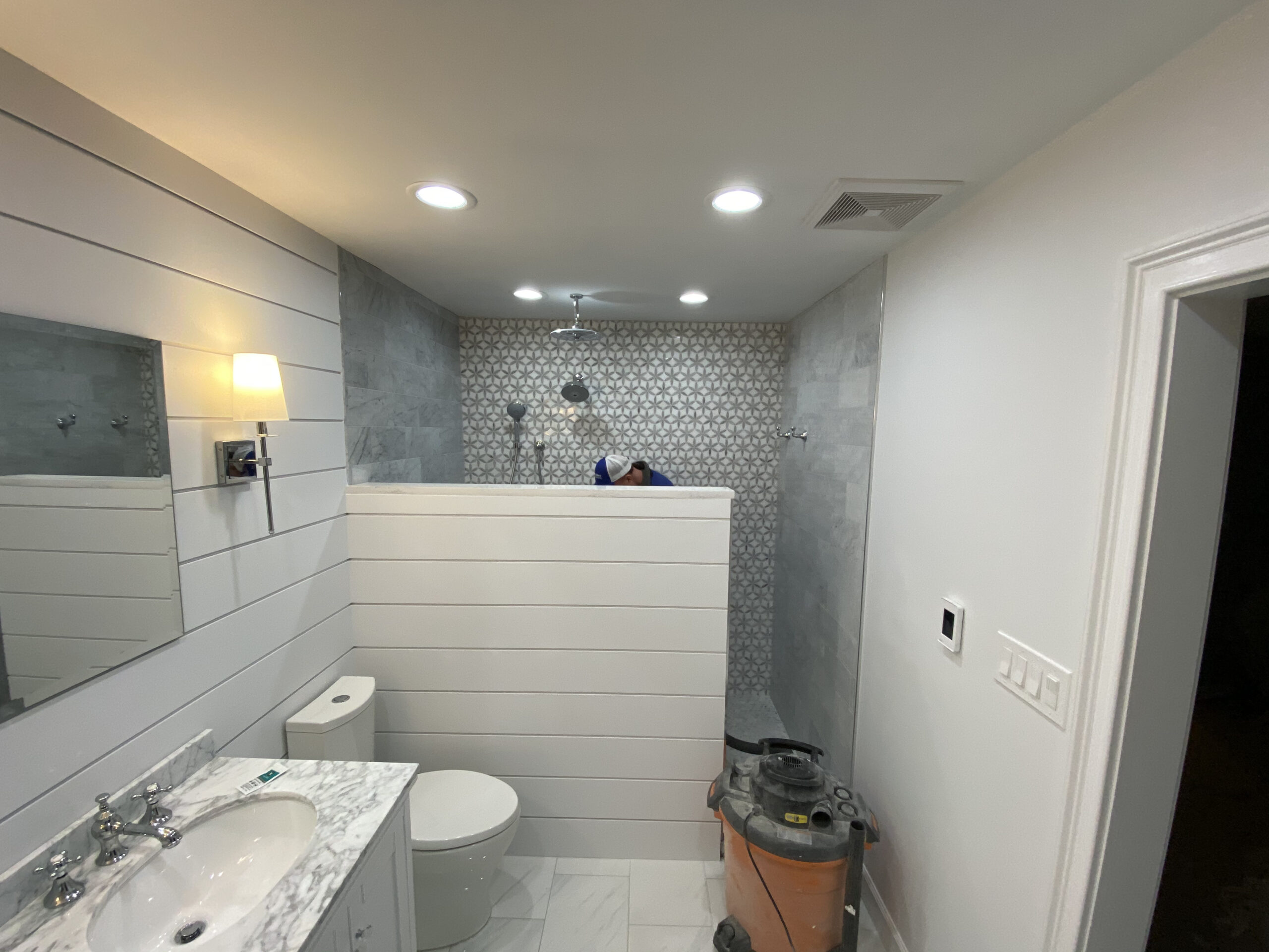 Bathroom in progress — large format tile