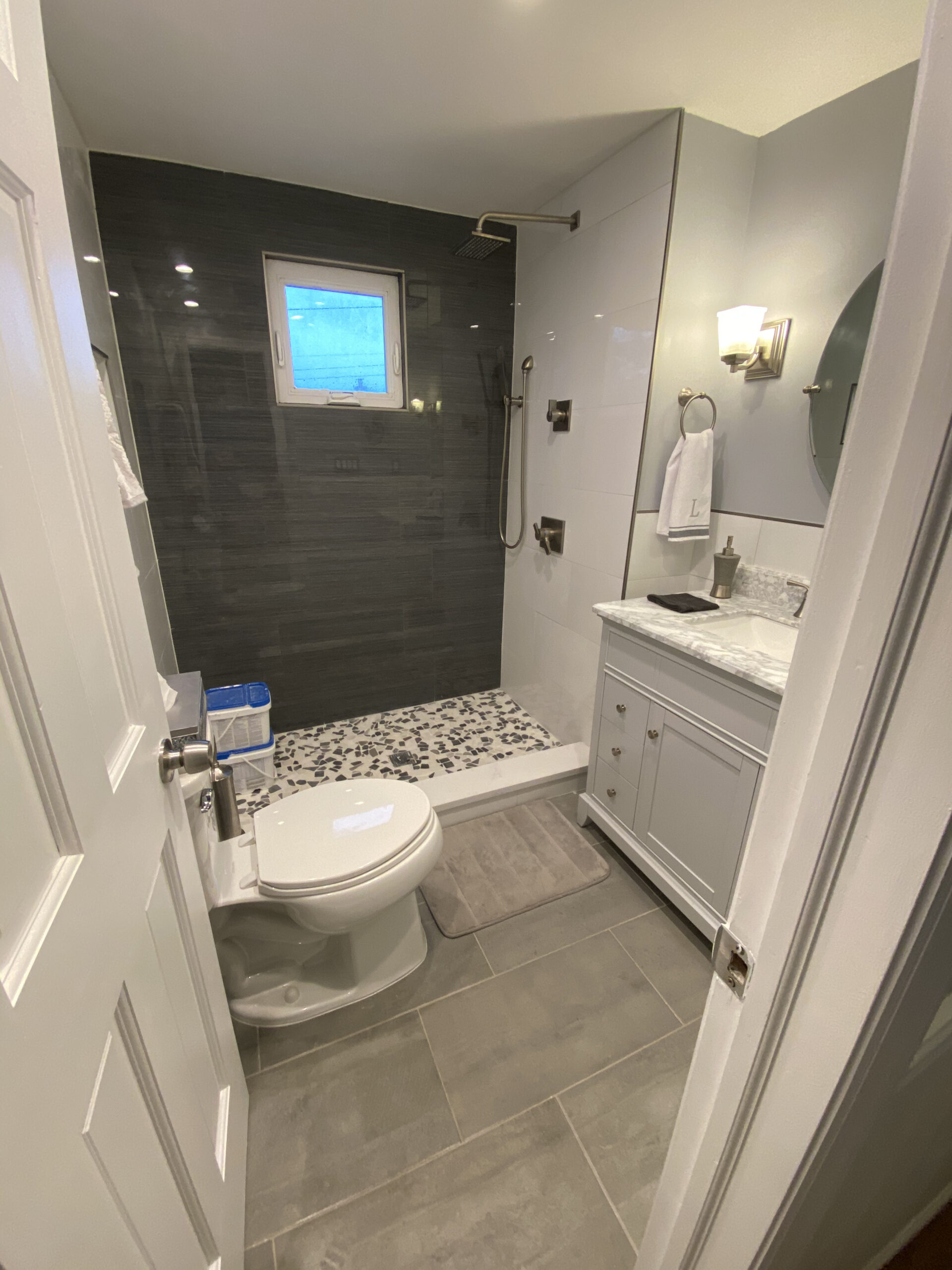 Bathroom remodel — dark tile shower