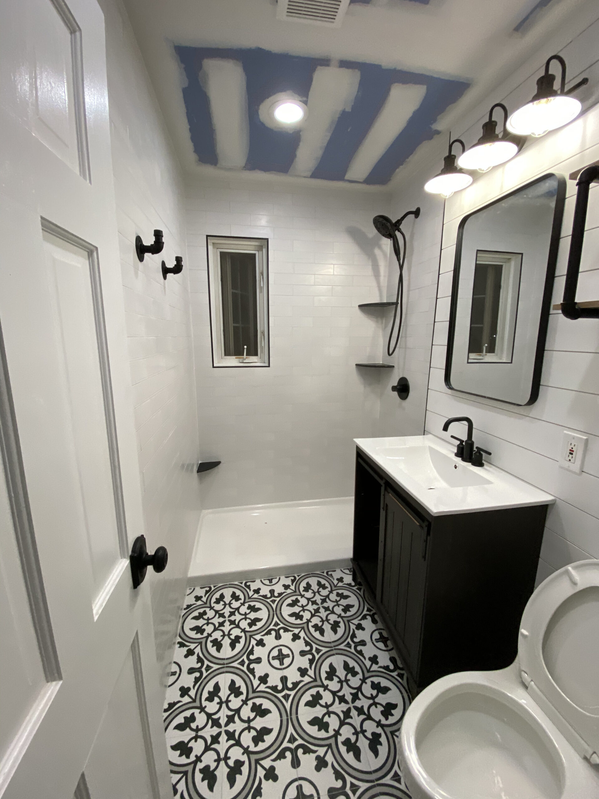 Bathroom remodel — mosaic floor, blue ceiling
